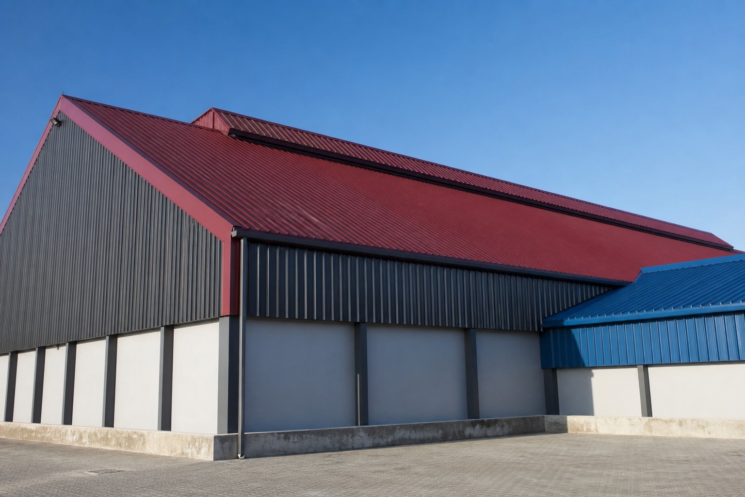 ral color coated steel roofing - industrial building roof and cladding finished with red and anthracite grey coated steel panels
