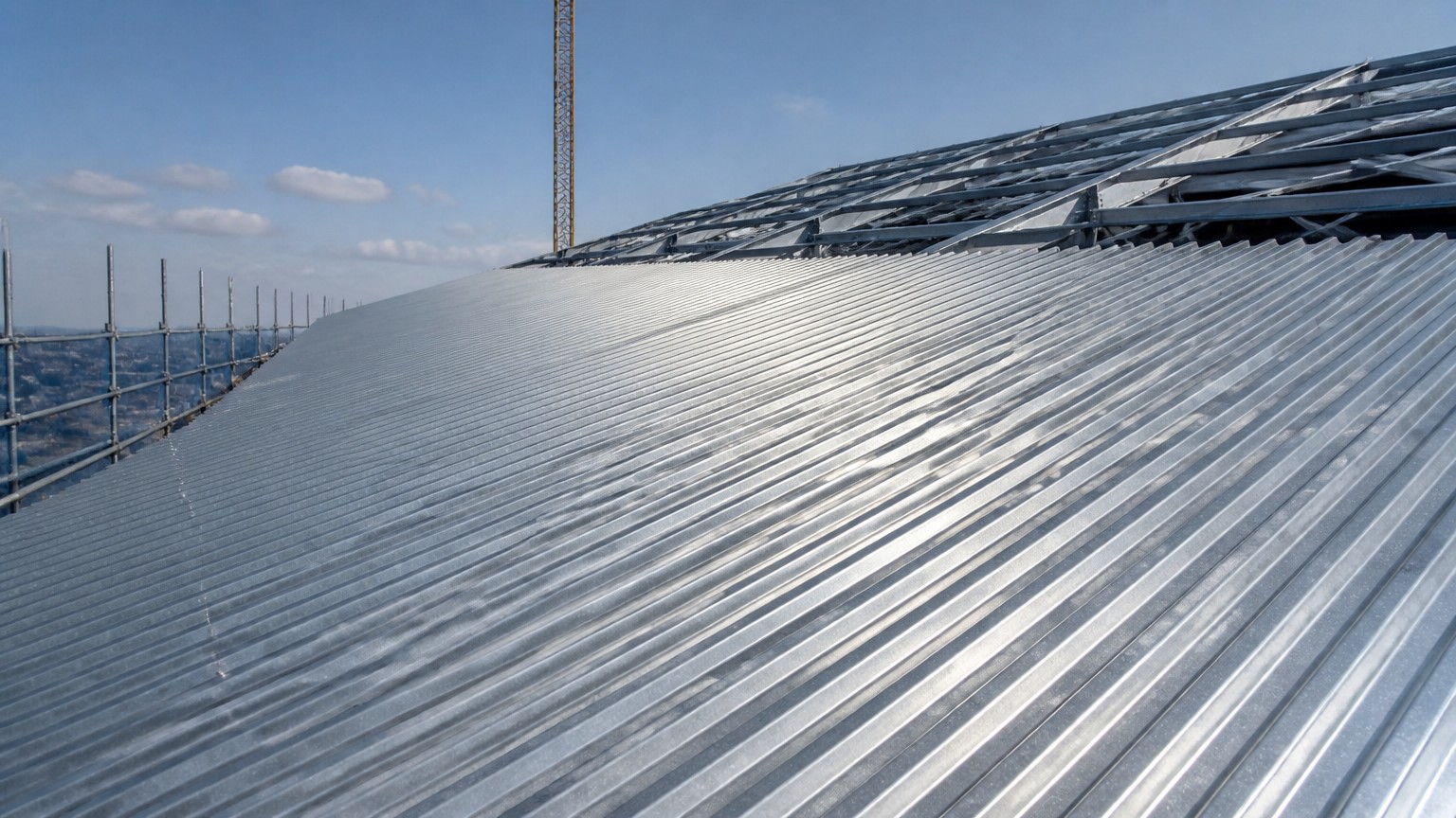 galvanized steel construction - corrugated galvanized roofing sheets fixed on a pitched roof structure
